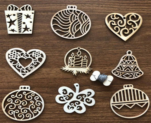 Novogodišnji drveni ukrasi 9 komada sR