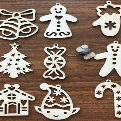 Novogodišnji drveni ukrasi 9 komada seA