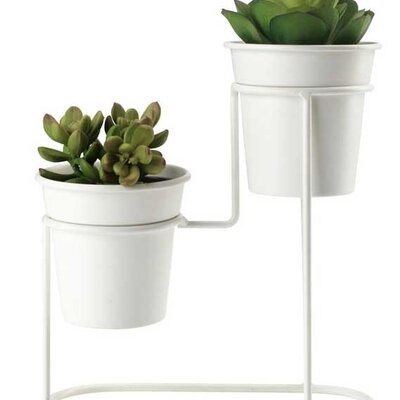 Stalak sa malim saksijama i veštačkim biljkama